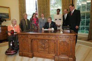 President George W. Bush signs an executive order for individuals with disabilities in emergency pre