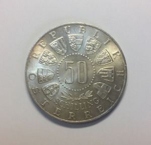 纪念币正面图片
正面设计：奥地利联邦省的九徽章和“共和国Osterreich”和“50先令”